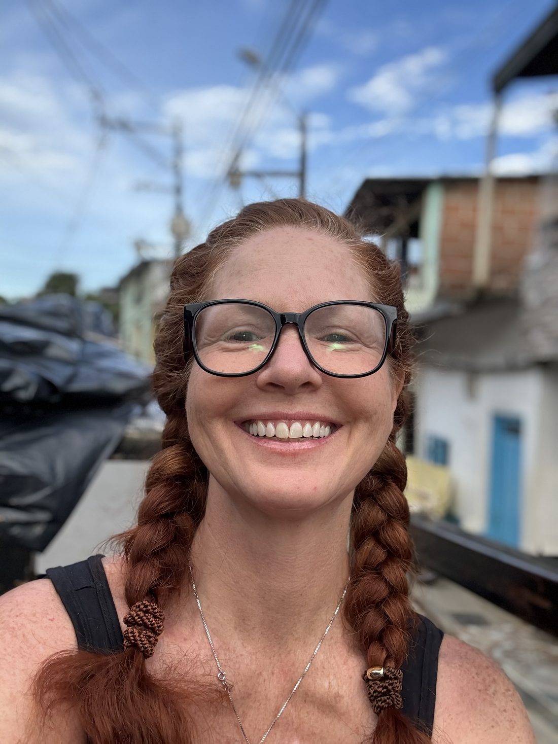 Marta Burton, smiling, outdoors in Colombia